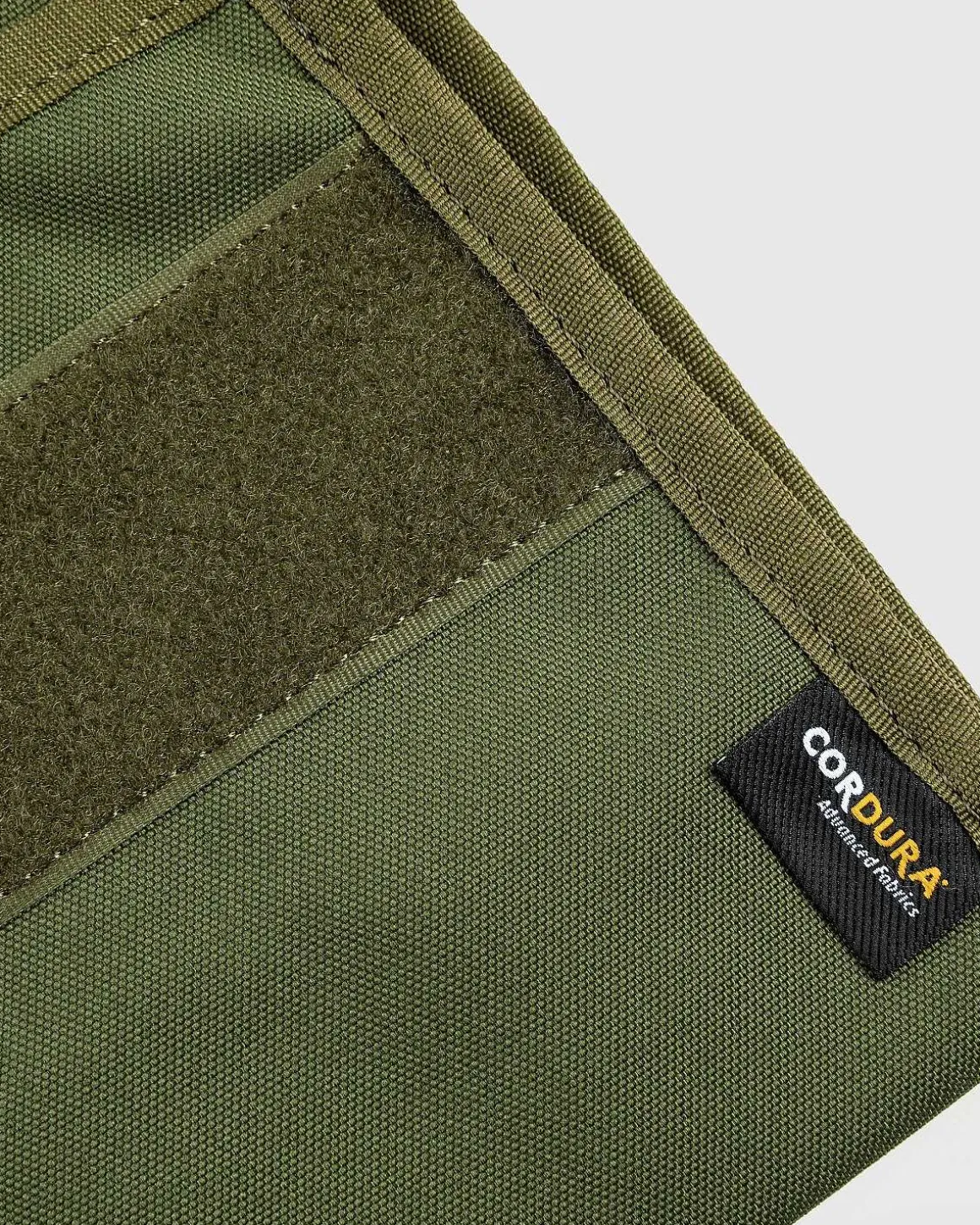 Cordura Halspose Oliven Trist